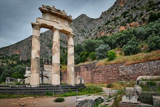 Tholos with Doric columns at the sanctuary of Athena Pronoia temple ruins in ancient Delphi