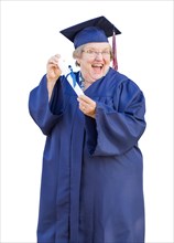 Happy senior woman and graduate in hat and gown holding diploma isolated on a white background