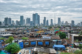 View of Mumbai skyline with skyscrapers over slums in Bandra suburb