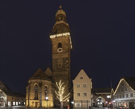 Christmas illuminated St. Johanniskirche in the evening