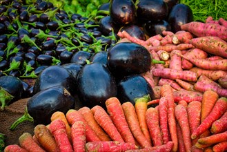 Vetegables carrots and aubergines in vegetable street market in India. Sardar Market