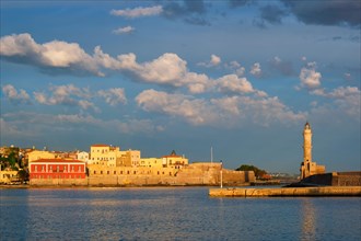 Picturesque old port of Chania is one of landmarks and tourist destinations of Crete island in the morning on sunrise. Chania