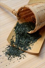 tea in bamboo strainer