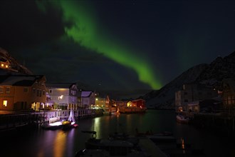 Small harbour with illuminated houses