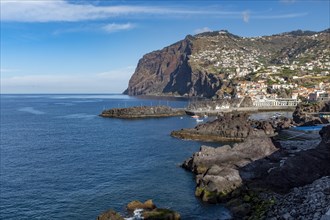 Village of Camara de Lobos with Cabo Girao in the background on Madeira