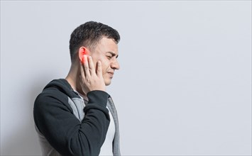 A person with otitis and tinnitus