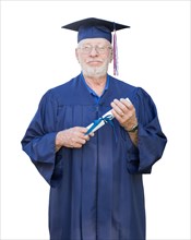 Proud senior man and graduate in hat and gown holding diploma isolated on a white background