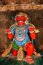 Tamil Hindu deity wood statue in Brihadishwarar Temple