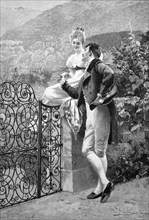 Young Couple Flirting at the Garden Fence
