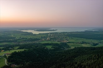 Aerial view of the Chiemsee and the town of Bernau at dusk in shallow sunset