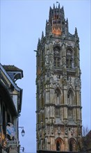 Tower of the church Eglise de la Madeleine in the Gothic flamboyant style in the early morning