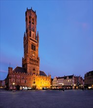 Belfry tower famous tourist destination and Grote markt square in Bruges