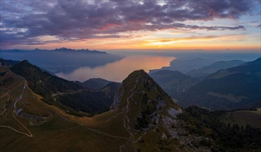 Aerial view with evening mood over the Dent de Jaman and Lake Geneva in the background