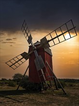 Backlit trestle windmill