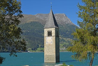 Church tower in the Reschenpass reservoir