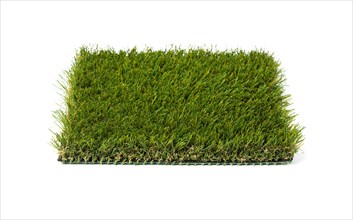 Section of artificial turf grass isolated on white background
