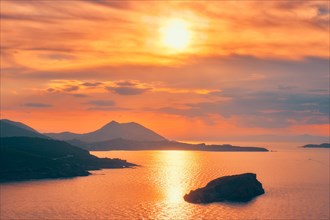Aegean Sea with Greek islands on sunset