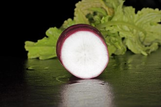 Cut fresh red radish with leaves
