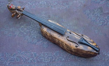 Wooden shoe violin or poor mans violin