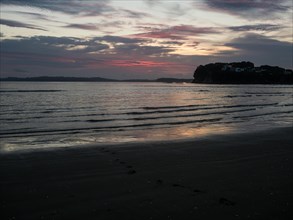Morning atmosphere in front of sunrise at Orewa beach
