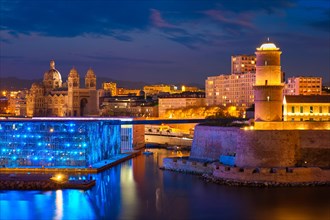 Marseille Old Port and Fort Saint-Jean and Museum of European and Mediterranean Civilisations and Marseille Cathedral illumintaed in night