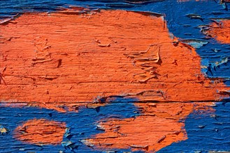 Old blue and orange painted wood wooden planks texture close up background
