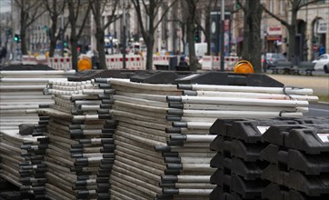 A stack of barrier fences for possible road closures in the street Unter den Linden