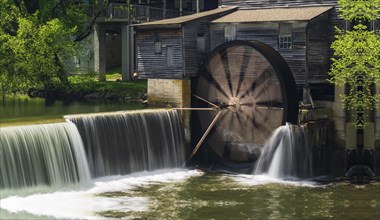 Pigeon forging mill in a small waterfall