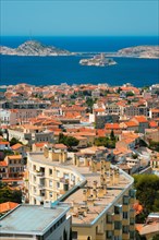 View of Marseille town and Chateau d'If castle famous historical fortress and prison on island in Marseille bay. Marseille