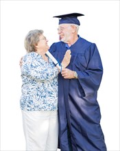 Senior man and graduate in hat and gown being congratulated by wife isolated on white