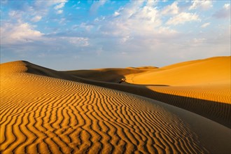 Sam Sand dunes of Thar Desert under beautiful sky on sunset
