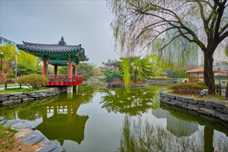 Yeouido Park public park pond with pavilion summerhouse in Seoul