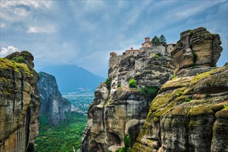 Monastery of Varlaam in famous greek tourist destination Meteora in Greece on sunset with scenic scenery landscape