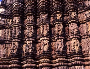 Sculptures on the exterior of the Duladeo temple walls in Khajuraho