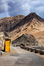Roadside toilet booth on road in Himalayas. Leh
