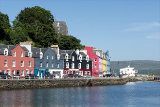 Colourful buildings on the waterfront in the harbour of the coastal town of Tobermory