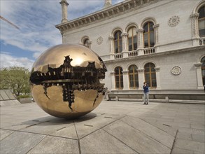 Globe by the Italian sculptor Arnaldo Pomodoro in the exterior of Trinity College