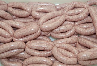 Links of pork sausages in the farm shop