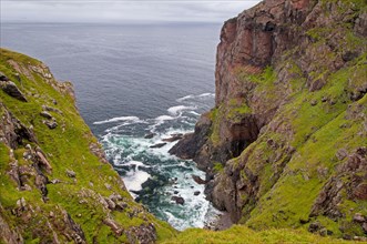 View of sea cliffs and small inlet