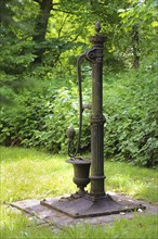 Old fountain with hand pump