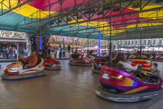 Ride with bumper cars at the city festival