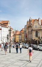 Tourists and colourful houses in the Lesser Quarter of Prague
