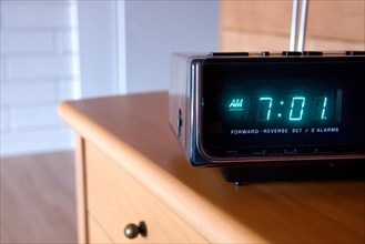 Alarm clock on night table