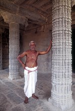 A Priest standing in Kampaheswarar Temple at Thirubuvanam