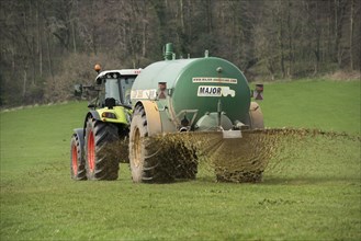 Claas tractor with slurry tanker