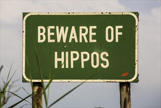 Warning sign against hippos