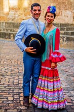 Couple in flamenco costumes at the folk festival