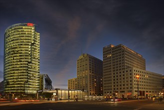Bahntower on the left and Beisheim-Center with Ritz Carlton Hotel on the right in the evening at Potsdamer Platz