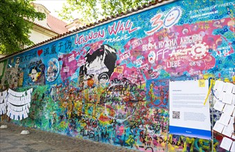 Colourful graffiti on John Lennon Wall