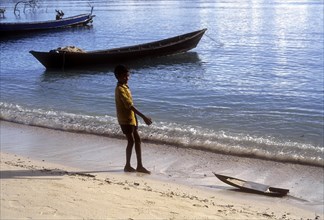 A boy playing in Havelock island beach